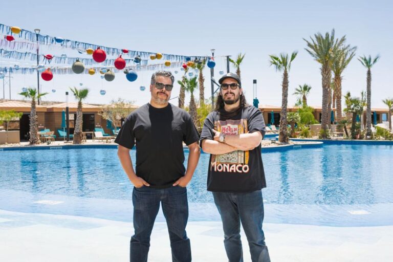 Owners of The Elmont Social Club standing by the resort-style pool in Montecillo, El Paso